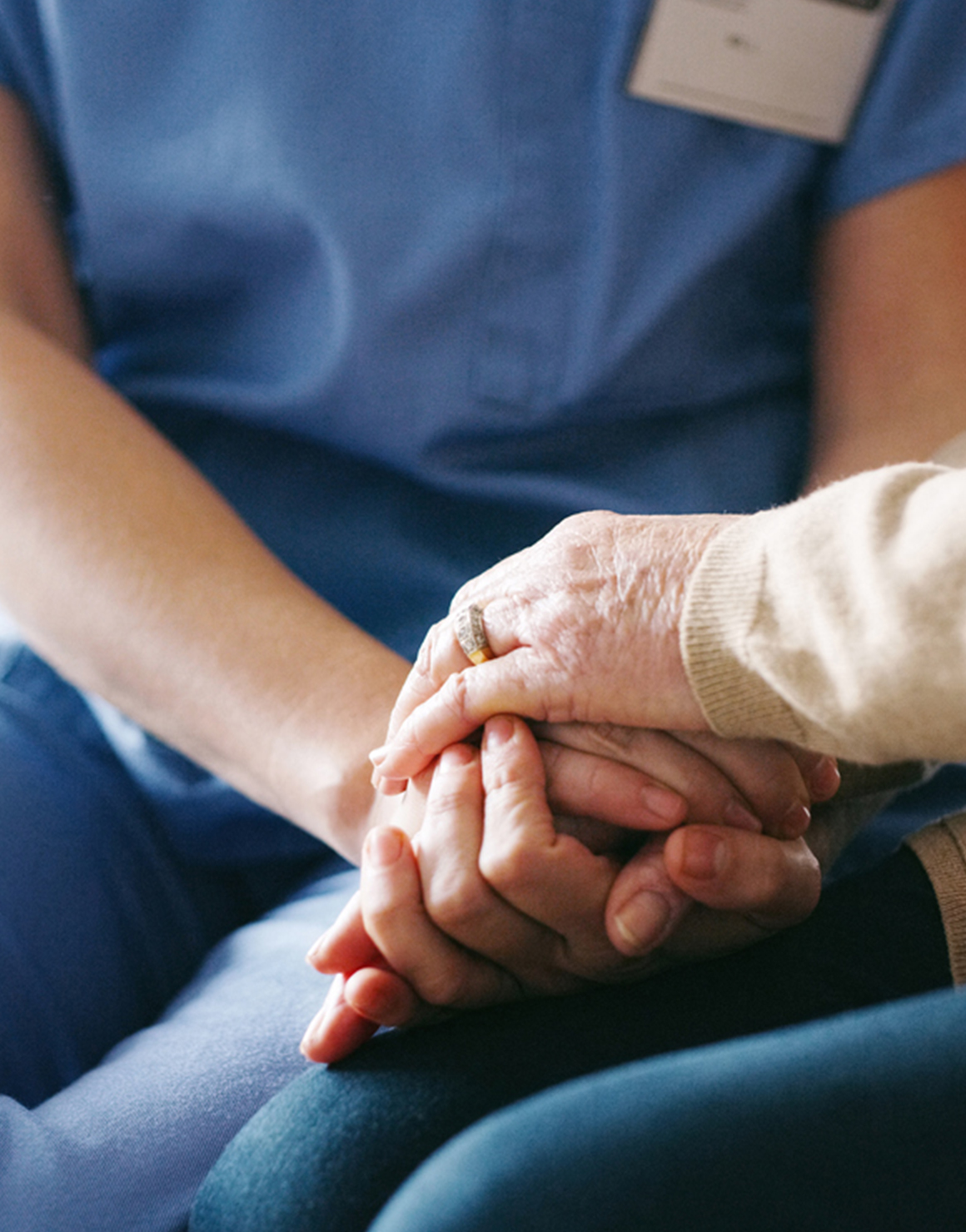 Employee walks with a Female Elderly Patient