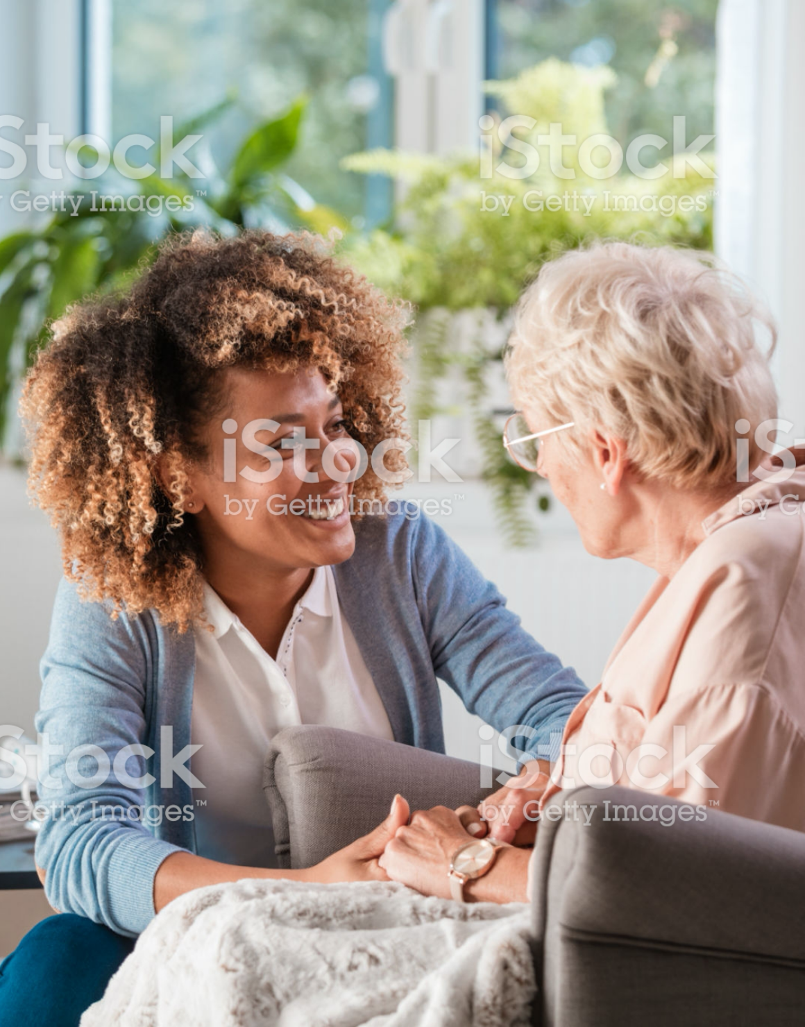 Employee walks with a Female Elderly Patient